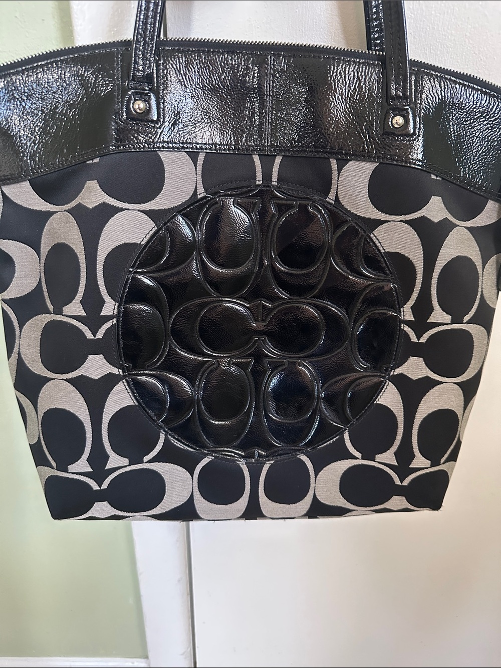 Coach Laura Tote. Black and Cream Signature Canvas Tote. Patent Leather Circle